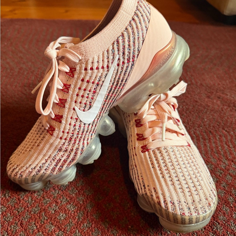 Nike Pink Athletic Sneakers with Breathable Knit Design